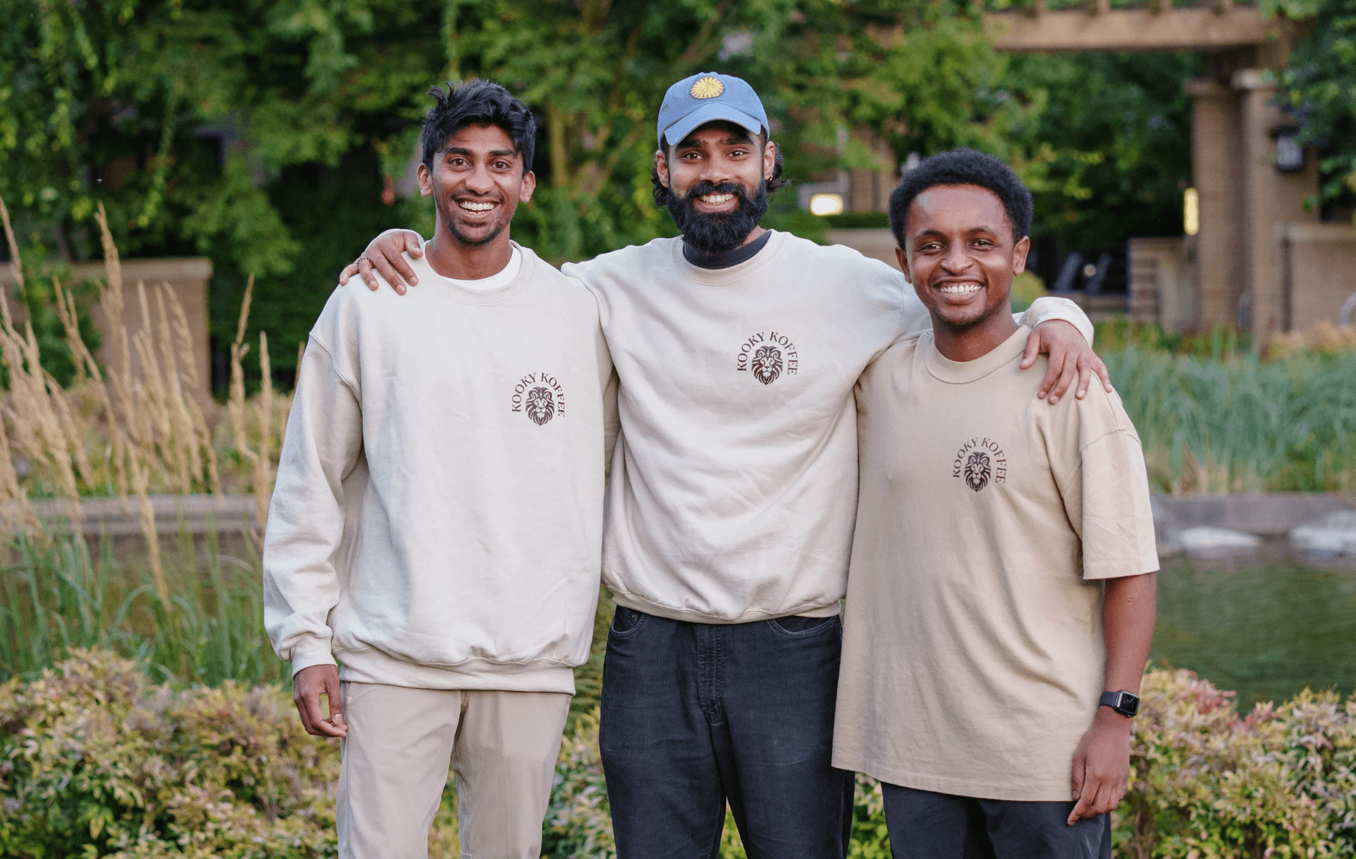 Kooky Koffee founders - three friends standing together